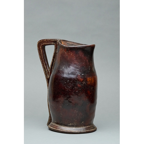 94 - A MID TO LATE 17TH CENTURY LEATHER BLACKJACK ALE JUG, ENGLISH, CIRCA 1660-1680. A finely shaped leat... 