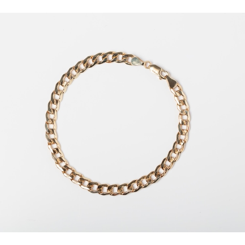 32 - A 9CT & SILVER BONDED CURB BRACELET A 21cm long Curb bracelet crafted in 1/10 9ct yellow gold and St... 