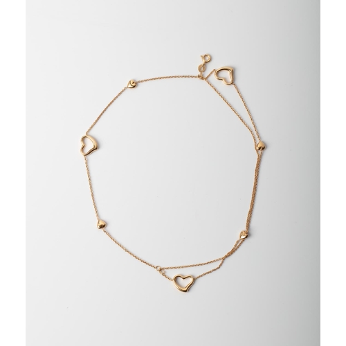 8 - A 9CT GOLD & SILVER BONDED HEART BRACELET A 18cm long triple strand heart bracelet crafted in 1/10 9... 
