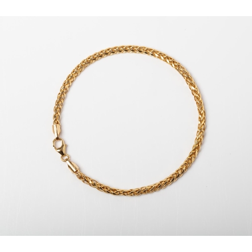 66 - A 9CT GOLD WHEAT LINK BRACELET A 19cm long Wheat Link bracelet crafted in 9ct yellow gold weighing 2... 