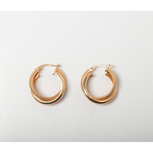 82 - 9CT GOLD CROSSOVER HOOP EARRINGS A pair of Crossover polished and textured hinged hoop earrings craf... 