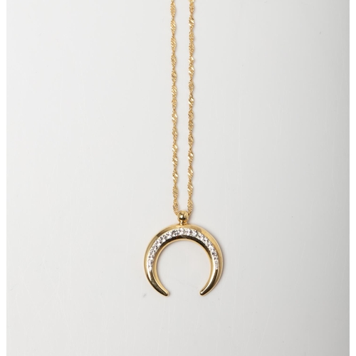 83 - A 14CT AND SILVER BONDED CRYSTAL HALF MOON NECKLACE A crystal studed Half Moon   necklace crafted in... 