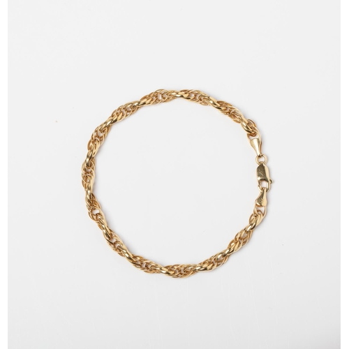 86 - A 14CT GOLD FANCY LINK BRACELET 14ct Gold Multi Link 18cm Bracelet  A 18cm long 14ct gold fancy link... 