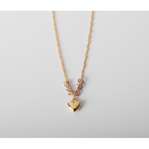 92 - A 14CT AND SILVER BONDED HEART AND LUCKY RINGS NECKLACE A Heart and Luck Ring  necklace crafted in 1... 