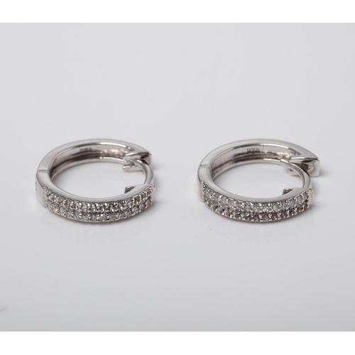 105 - SILVER WHITE SAPPHIRE AND DIAMOND HOOP EARRINGS Crafted in Sterling Silver set with 28 Round Diamond... 