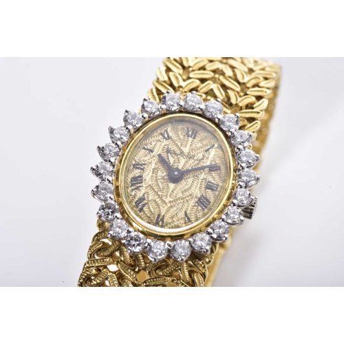 414 - A LADY'S DIAMOND AND GOLD WRISTWATCH, BUECHE GIROD