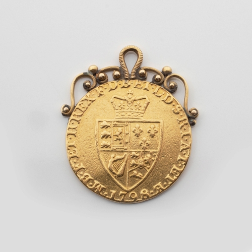 465 - A GOLD COIN PENDANT