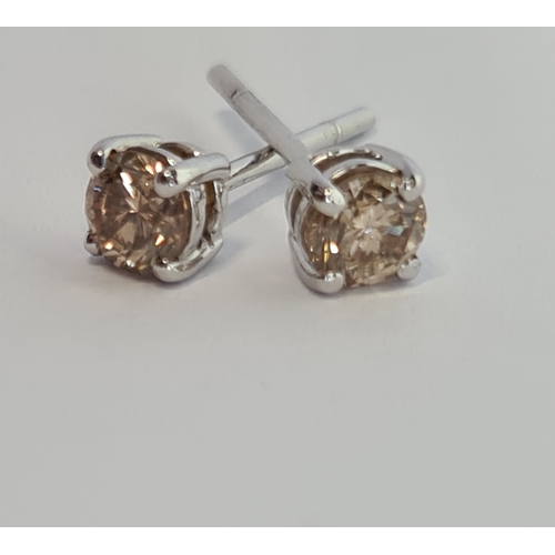 508 - A PAIR OF DIAMOND EAR STUDS