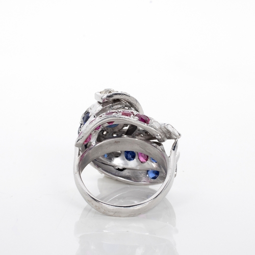 518 - A SAPPHIRE, RUBY AND DIAMOND RING