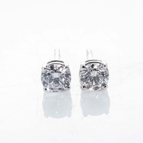 535 - A PAIR OF DIAMOND EAR STUDS