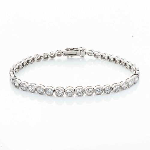 539 - A DIAMOND TENNIS BRACELET