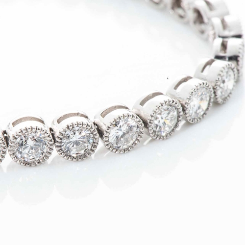 539 - A DIAMOND TENNIS BRACELET