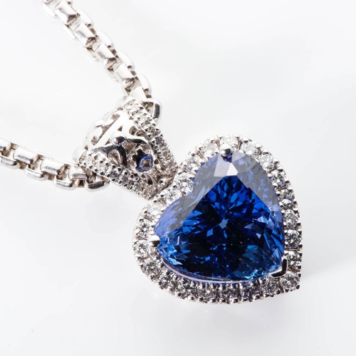 548 - A TANZANITE AND DIAMOND PENDANT