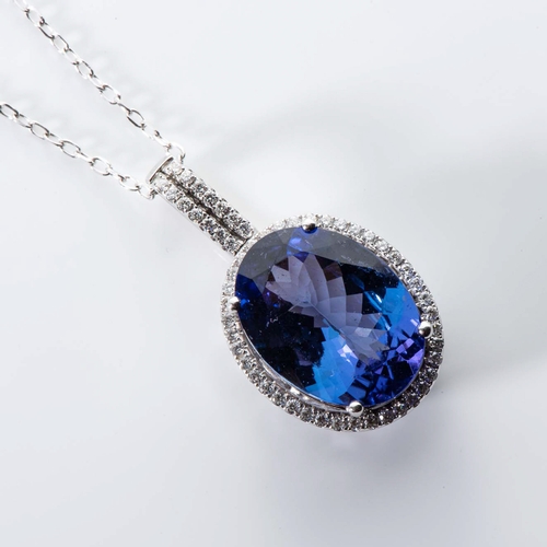 555 - A TANZANITE AND DIAMOND PENDANT