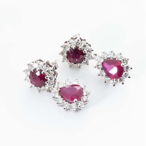 556 - A PAIR OF RUBY AND DIAMOND PENDANT EARRINGS