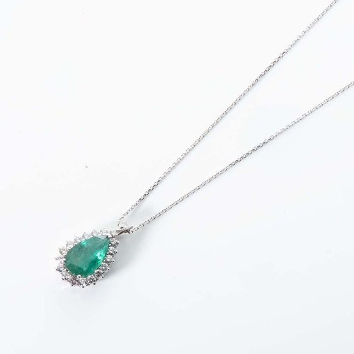 558 - AN EMERALD AND DIAMOND PENDANT