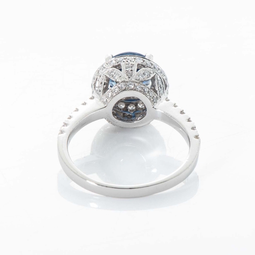 559 - A SAPPHIRE AND DIAMOND RING