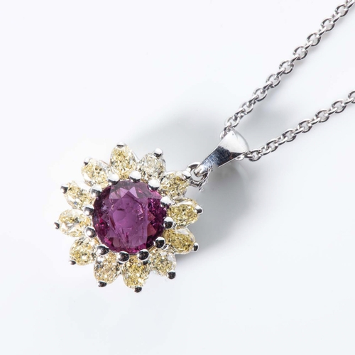 562 - A RUBY AND DIAMOND PENDANT