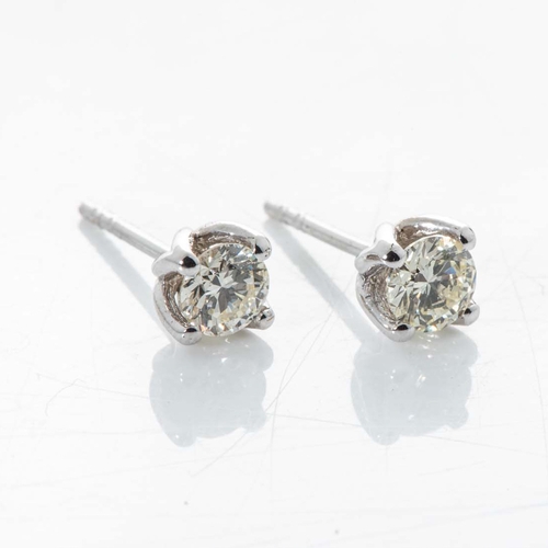 563 - A PAIR OF DIAMOND EAR STUDS