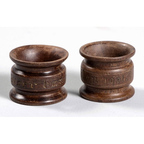 68 - A PAIR OF ANGLO-BOER PRISONER OF WAR WOODEN NAPKIN RINGS