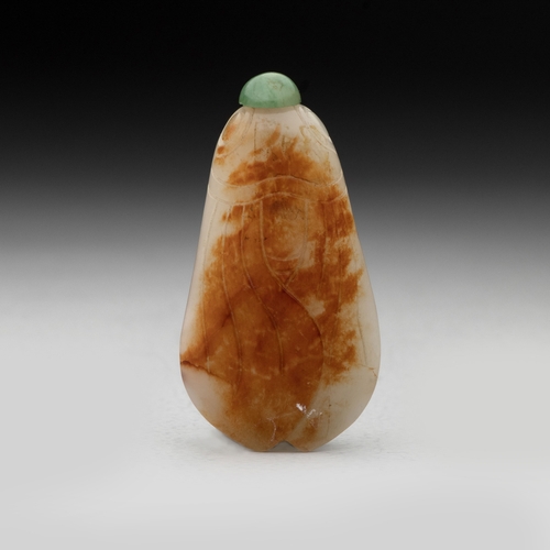 692 - A CHINESE WHITE AND RUSSET JADE âCICADAâ SNUFF BOTTLE, QING DYNASTY, 19TH CENTURY