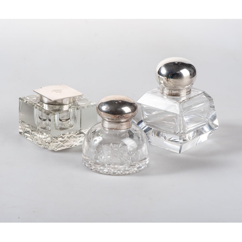 49 - THREE LARGE SILVER-MOUNTED GLASS INKWELLS