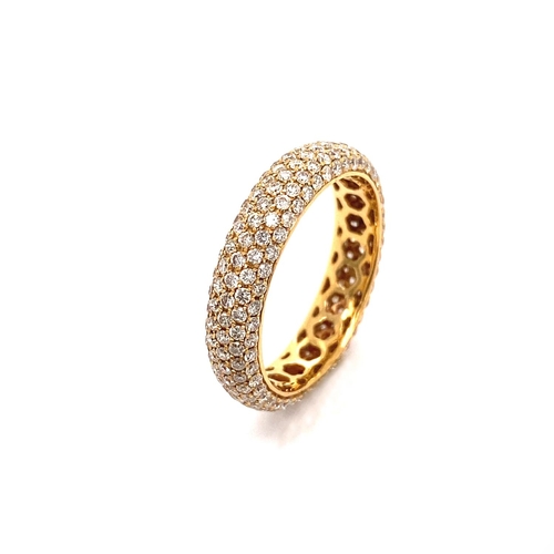 9 - A PAVE FULL ETERNITY DIAMOND RING A Pave Full Eternity Diamond Ring crafted in 18K Rose Gold, set wi... 