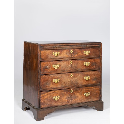 121 - A GEORGE III WALNUT CHEST-OF-DRAWERS