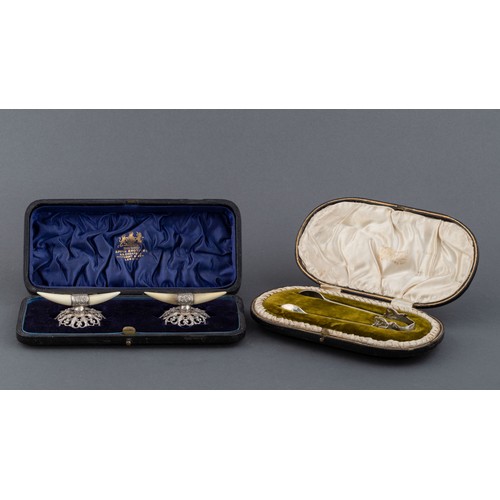 1045 - A CASED PAIR OF VICTORIAN SILVER AND IVORY KNIFE RESTS, MAPPIN BROTHERS, SHEFFIELD, 1898