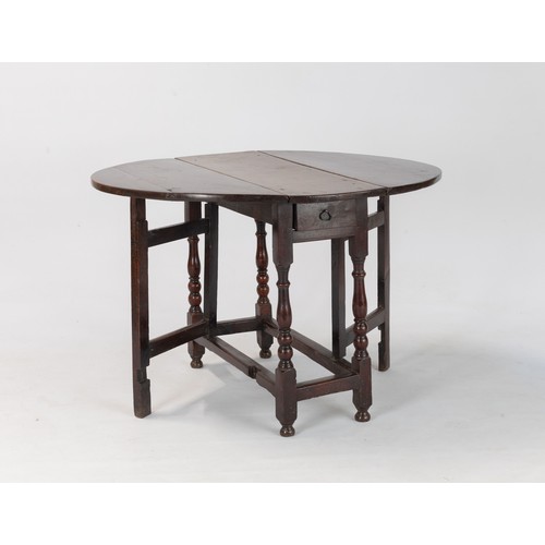 112 - AN OAK GATELEG TABLE, 18TH CENTURY