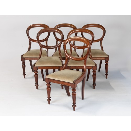 125 - A SET OF SIX VICTORIAN WALNUT SIDE CHAIRS