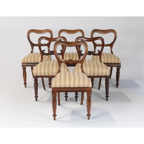 131 - A HARLEQUIN SET OF SIX VICTORIAN WALNUT BUSTLE BACK CHAIRS