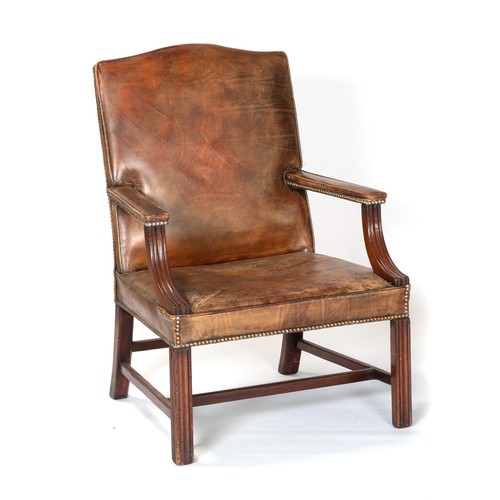 135 - A LEATHER ARMCHAIR