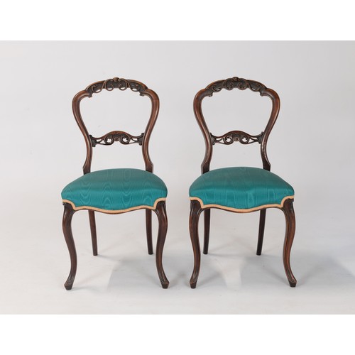 129 - A PAIR OF VICTORIAN WALNUT PARLOUR CHAIRS