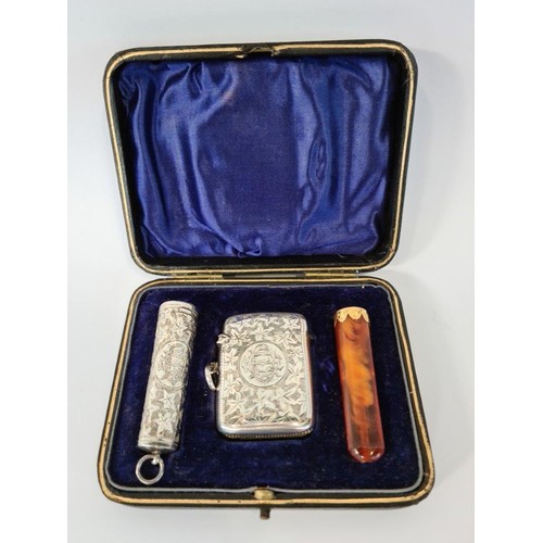 1072 - A SILVER VESTA CASE, CIGARETTE HOLDER CASE AND CIGARETTE HOLDER, SHEFFIELD, 1919