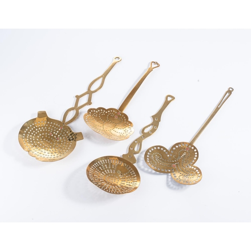 154 - A COLLECTION OF FOUR ASSORTED BRASS STRAINING LADLES