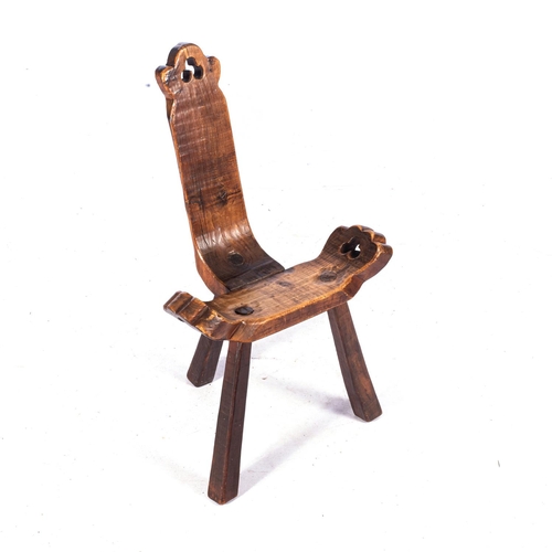 87 - AN OAK MILKING STOOL