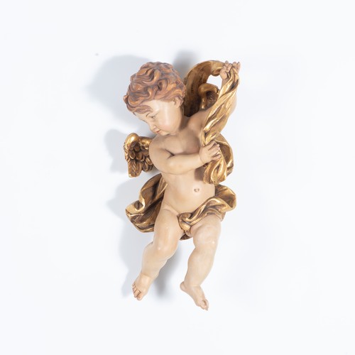 152 - A PAIR OF ITALIAN CARVED AND PAINTED PUTTI