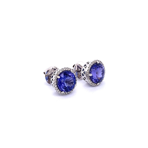 93 - PAIR OF ROUND TANZANITE & DIAMOND HALO STUD EARRINGS