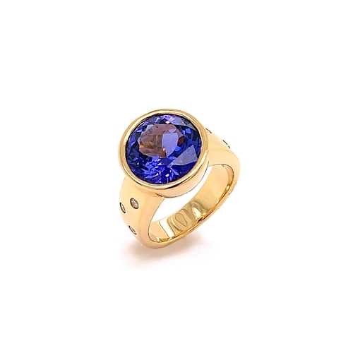 229 - TUBE SET TANZANITE RING WITH SWISS SET DIAMONDS