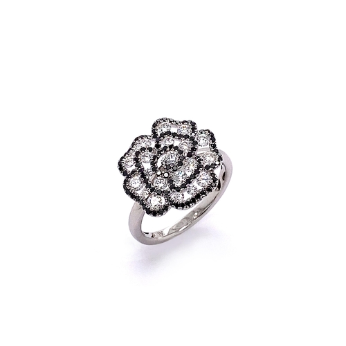 232 - FLOWER DESIGN BLACK AND WHITE DIAMOND RING