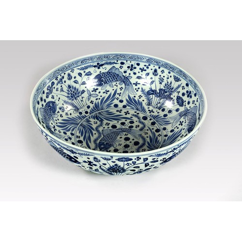 991 - A MASSIVE CHINESE BLUE AND WHITE 'CARP' BOWL, CONTEMPORARY