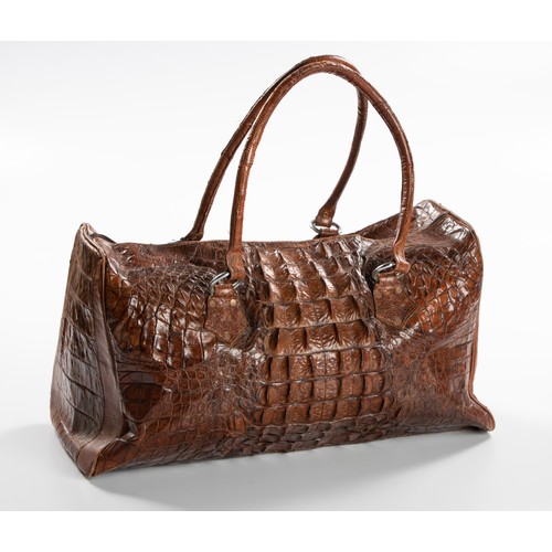 764 - A VINTAGE CROCODILE LEATHER DUFFEL BAG