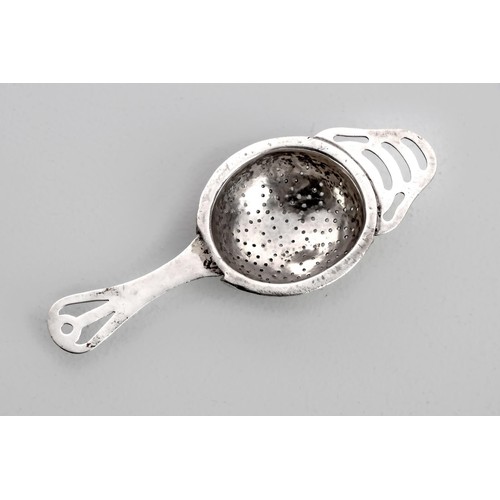 1141 - A GEORGE V SILVER TEA STRAINER, MAKER'S MARKS RUBBED, BIRMINGHAM, 1933