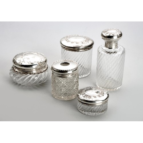 1172 - A SET OF THREE SILVER MOUNTED DRESSING TABLE BOTTLES