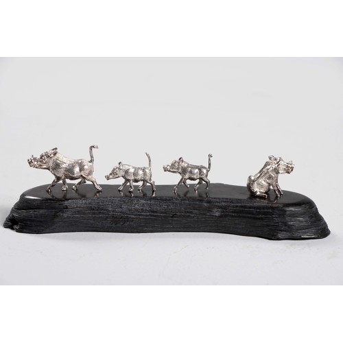 1226 - A CAST SILVER GROUP OF WARTHOGS, PATRICK MAVROS