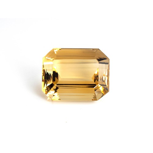 551 - AN UNMOUNTED EMERALD-CUT CITRINE