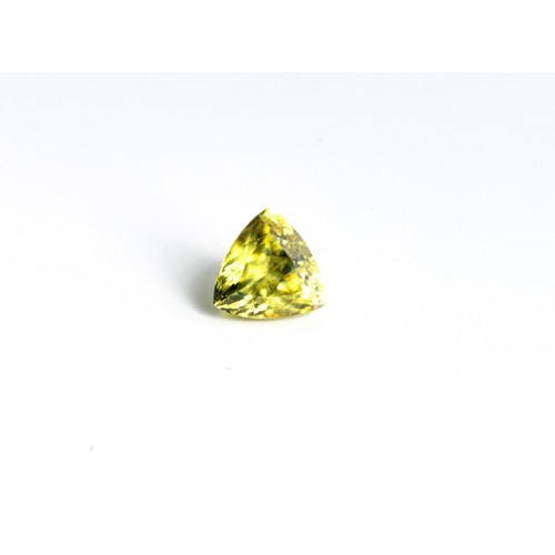 553 - AN UNMOUNTED TRILLION-CUT DEMANTOID GARNET