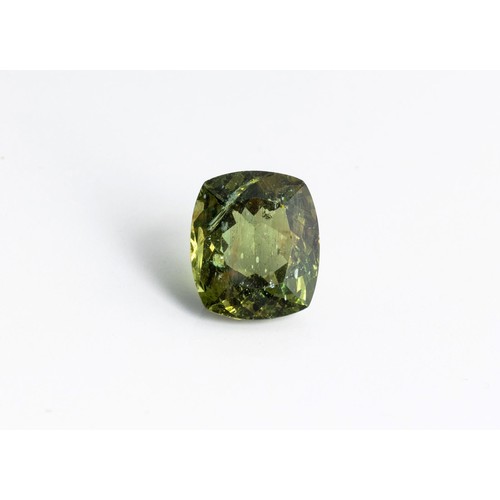 556 - AN UNMOUNTED CUSHION-CUT GREEN APATITE