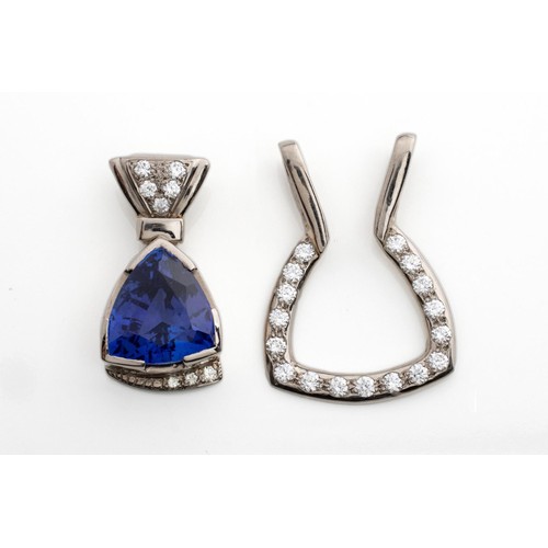 624 - A TANZANITE AND DIAMOND PENDANT SET